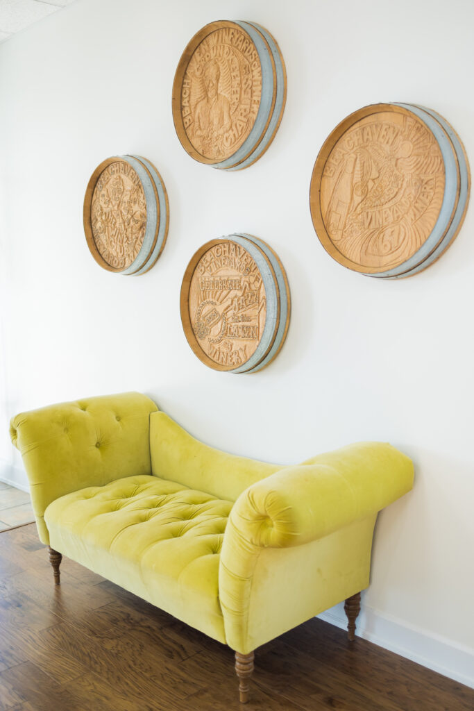 Detail photo of a couch and winery lids.